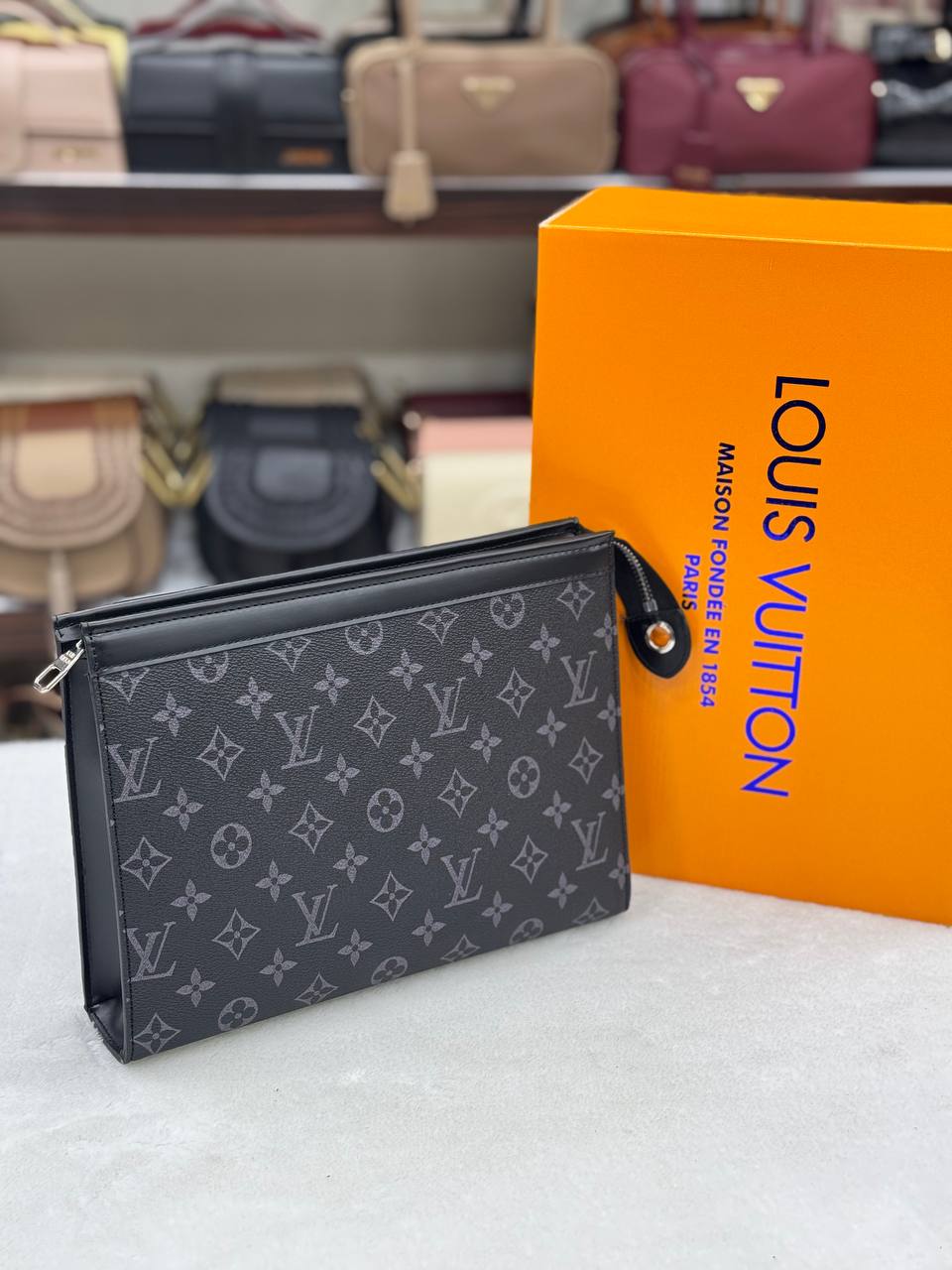 Louis Vuitton monogram clutch size27x20