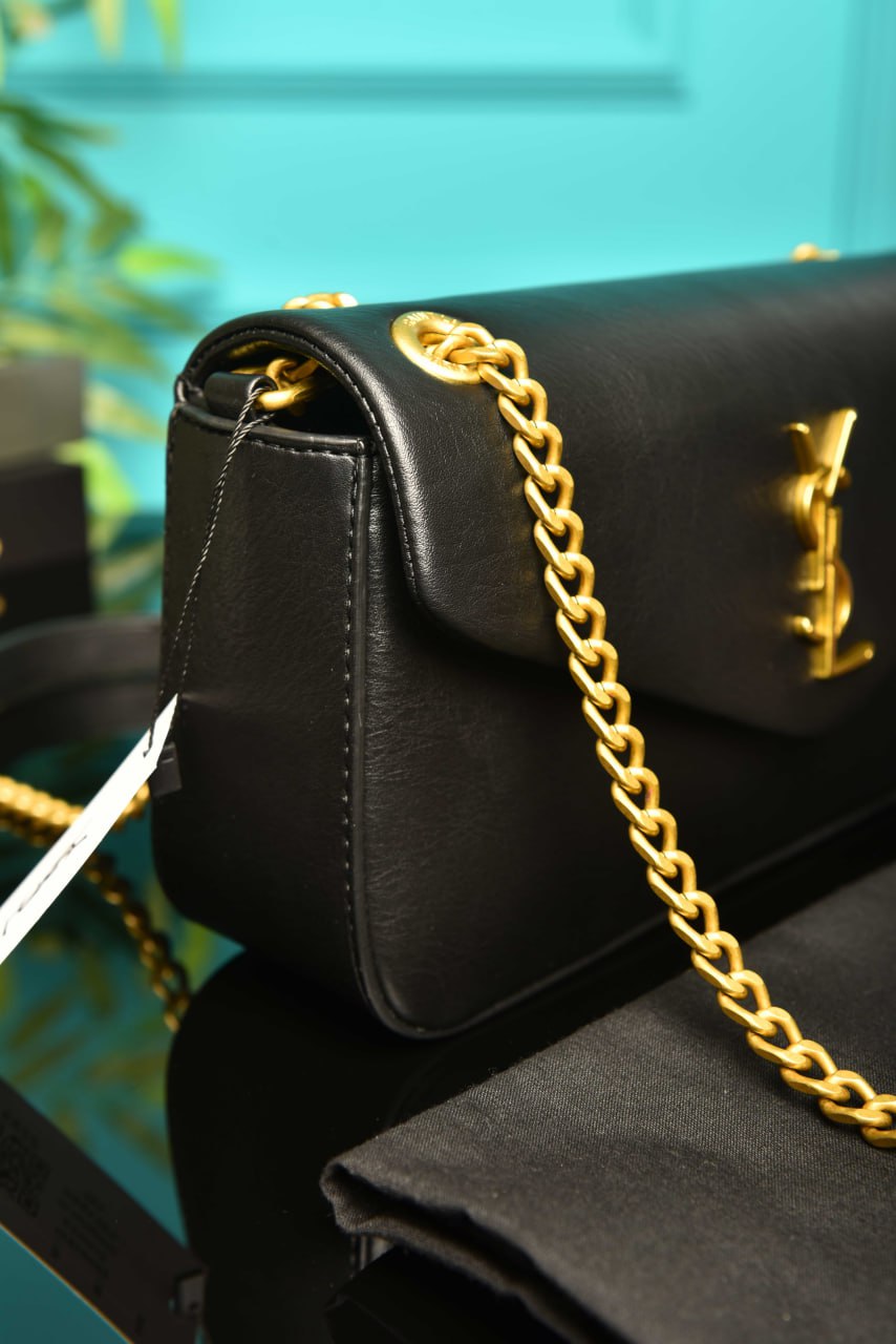 2253 - YVES SAINT LAURENT - Calypso Medium 26.5 × 15 × 7 c