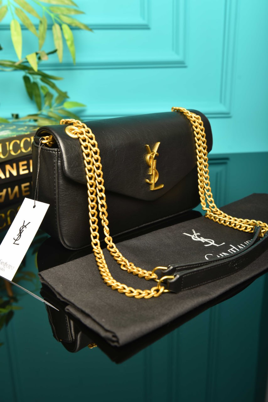 2253 - YVES SAINT LAURENT - Calypso Medium 26.5 × 15 × 7 c
