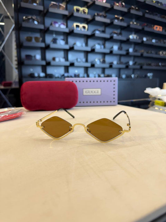 Gucci χρυσό καφέ