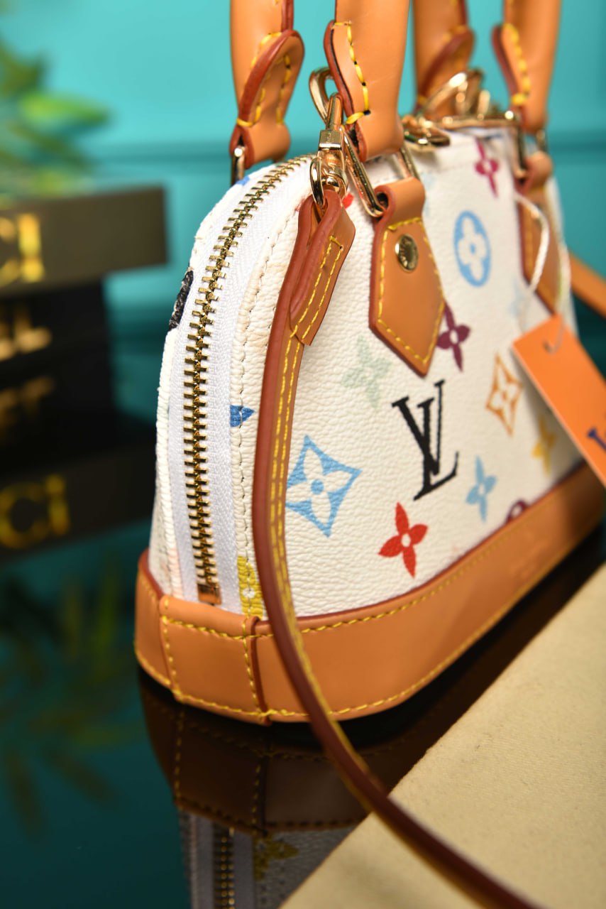 2207 - LOUIS VUITTON - LV x TM Nano Alma Ölçüler: 18 × 12 × 8 cm İTHAL AKS  FİYAT :23$